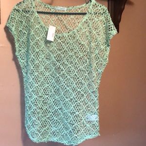 Short sleeve loose fitting crochet top